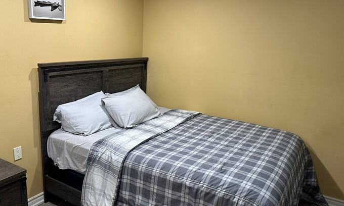 Brampton House | 1 bedroom basement suite with spacious living room and laundry, no kitchen.