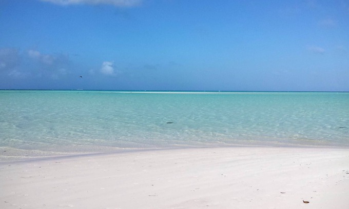 Spanish Wells Cottage | 1 minute golf cart ride to a beautiful, white powder-sand beach