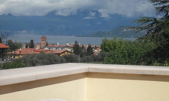 Lazise Apartment | 110 sq beautiful apartment with terrace overlooking the lake, pool and garden