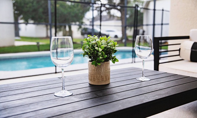 Trafalgar Village House | 13 MILES to DISNEY! POOL VILLA -4BR-3BA-BBQ-KING SUITE