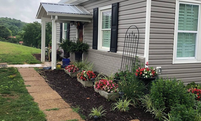Tyler House | 1912 Farmhouse has large, covered porch & fire pit! Near Casino & The Pinnacle