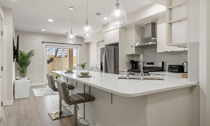 Sage Hill Apartment | 1BR Walk Out Suite » Backyard » Patio » 65” TV