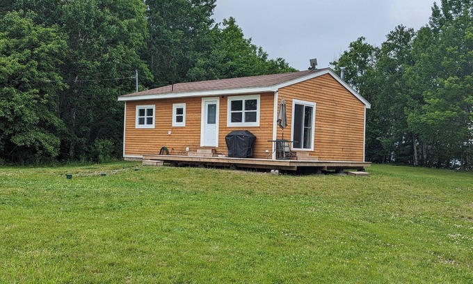 Inverness County Cottage | 2-Bedroom Cottage On Lake Ainlsie Private Beach, Enjoy Fishing & Swimming.