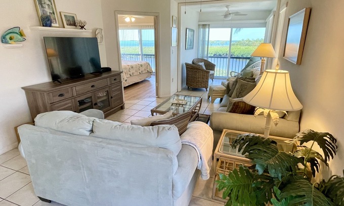 Rock Harbor House | 2 BR-2bath Waterfront townhome. Amazing sunsets, Marina & ramp on premises.