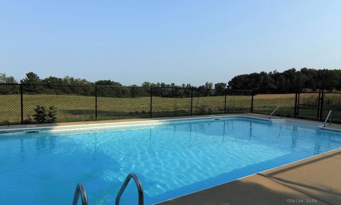 Marengo House | 20-acre Private Family Farmhouse with Event Barn, Private Fishing Pond, and Pool