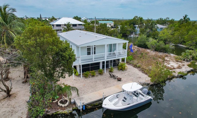 Breezeswept Beach Estates House | 3 Bed 2 Bath Canal Front home with great boating