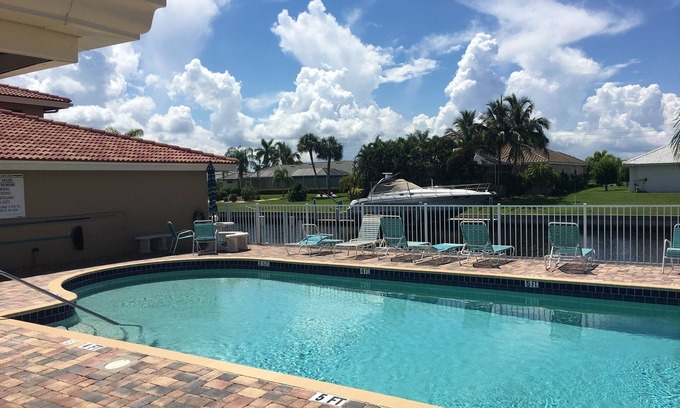 Punta Gorda Condo | 3 Bedroom 2nd story canal front condo across street from Fishermans Village