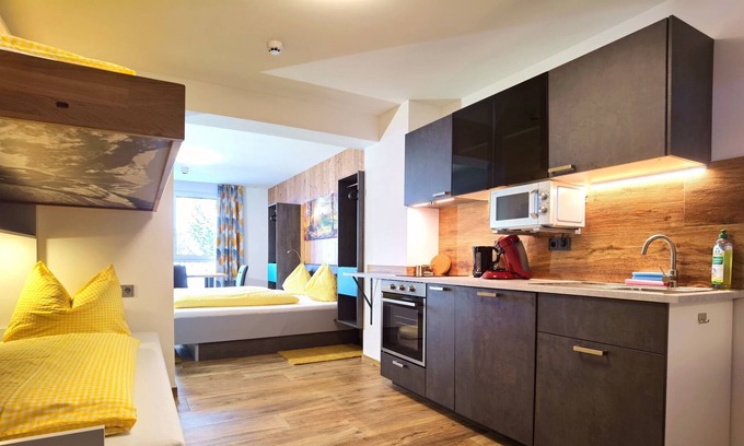 Alpendorf Apartment | 4 - 5 Bed Studio Standard without Balcony