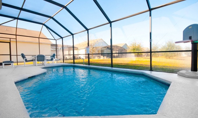Sunset Ridge House | 4 Bedroom 3 Bathroom Vacation Pool Home With Garage. Orlando, Florida.