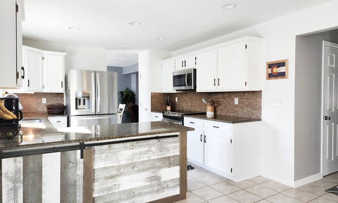 Aurora House | 4 Bedroom Home with 2 living rooms, patio, & backyard.