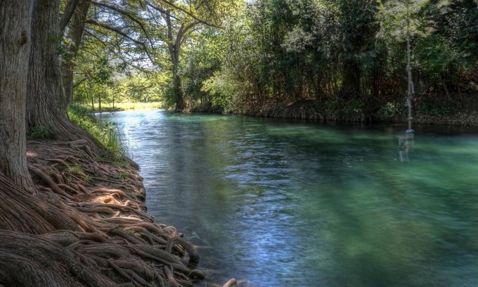 Utopia House | 4-bedroom house in Utopia with 450’ of private crystal clear Sabinal river front