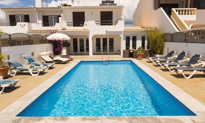 Luz Villa | 4 or 5 bedroom Villa rental luz Sleeps 8 or10, Heated Pool Available, Air con,