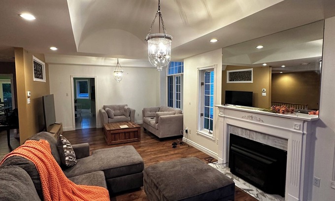 West End House | 5-bedroom oasis in central St. John's, featuring a deck overlooking lush greens.