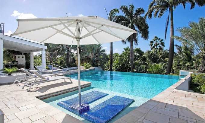 Plum Bay Villa | 5-bedroom villa with heated pool, sauna & tenniscourt within a minute walk from