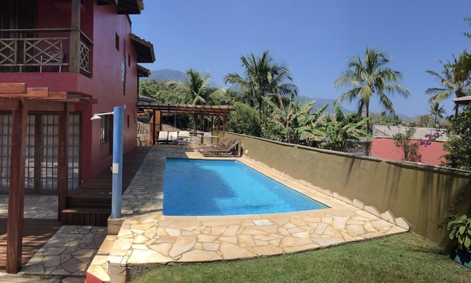 Maresias House | 5 suites near the beach, swimming pool, grass beach tennis court, billiards and wi-fi