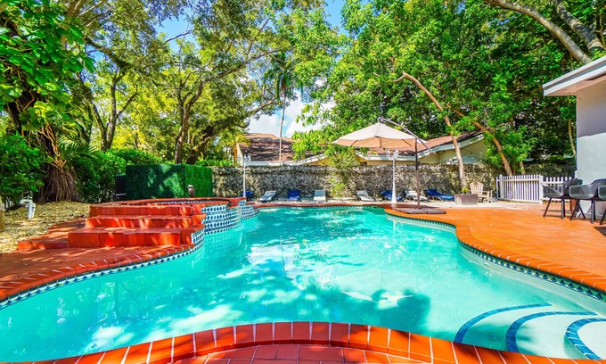 Northeast Coconut Grove House | 7BR 5BA Dream: Sleeps 15, Pool, Hot Tub, Wi-Fi, TVs, Gated Parking