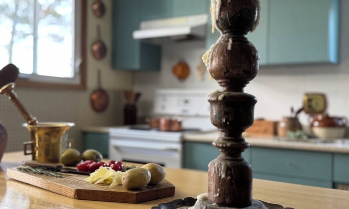 Cap-Pele Ski Chalet | A cottage among the trees, a cape, a beach.