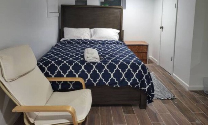 Weequahic Apartment | A cozy basement with queen-size beds Free WiFi, and a Smart TV with Roku.