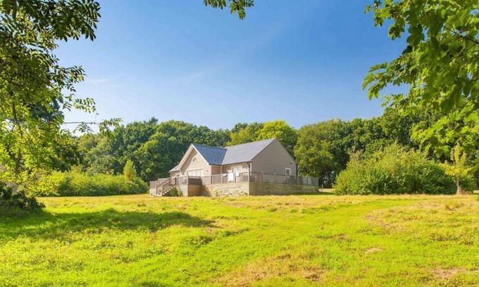 Pattiswick Cabin | A delightful lodge with hot tub on Wakes Hall Farm is a haven of peace in 500 acres of private land