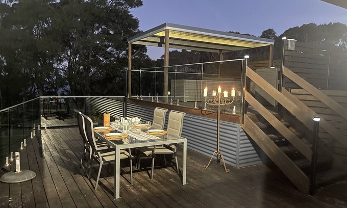 Malua Bay House | A lovely cosy cottage with a delightful double deck to enjoy the views