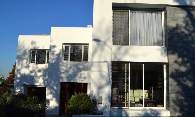 Carrasco House | A newspaper house in a residential area