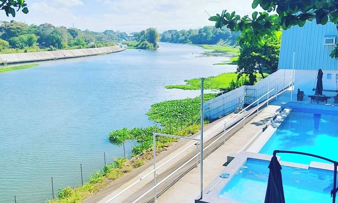 Malolos City House | A slice of paradise with a beautiful river view and infinity pool.