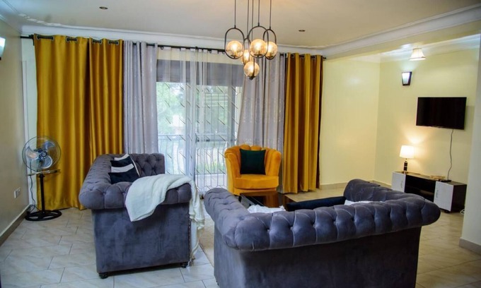 Entebbe Apartment | A spacious greenery hideout with a botanical garden view
