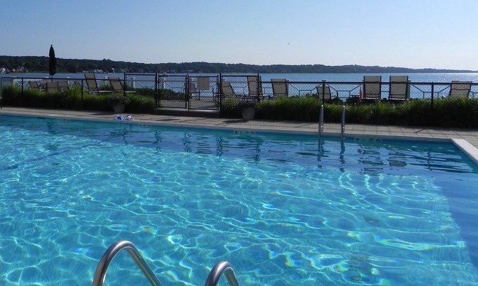 Hampton Bays Condo | A Unique Piece of Paradise, Water Front pool on Shinnecock Bay