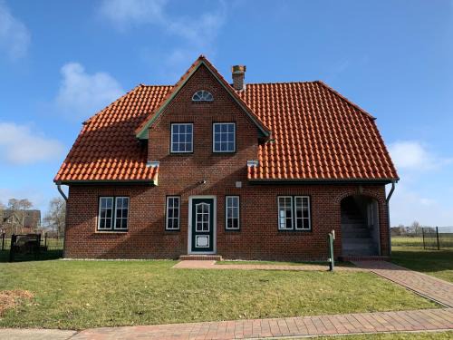 Vollerwiek Apartment | Abendstille, Ferienwohnung für maximal 4 Erwachsene und 2 Kinder in DE FEERJENHUSEN am Haubarg von Vollerwiek