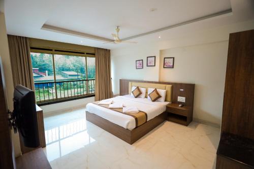 Adyar Hotel | Adyar Plaza Inn by RAK Rooms, Mangaluru