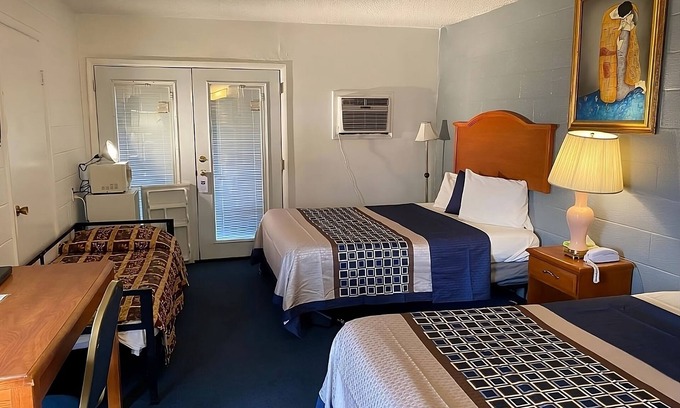 Fairview House | Affordability Meets Comfort at Knights Inn Fairview! 4 Great Units, Free Parking