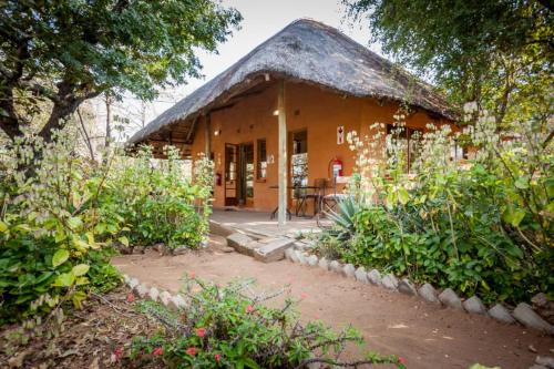 Kasane Ski Chalet | African Sunsets (Bophirimo Self-Catering Guest House)