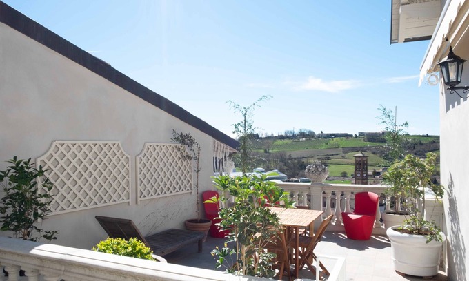 Ottiglio Apartment | Ai Leoni Ruhhenti - Enchanted Terrace amidst the Golden Hills of Monferrato