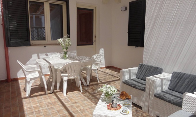 Torre San Giovanni Apartment | Air-Conditioned Apartment In Central Location Close to Beaches with Terrace