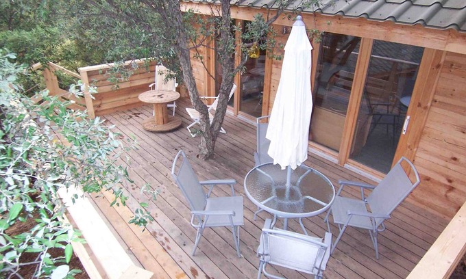 Oletta Apartment | Albaria Lodge, pavilions nestled in the trees, quiet, with terrace 4pers