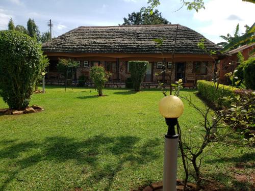 Entebbe House | Alice Gardens and Campsite