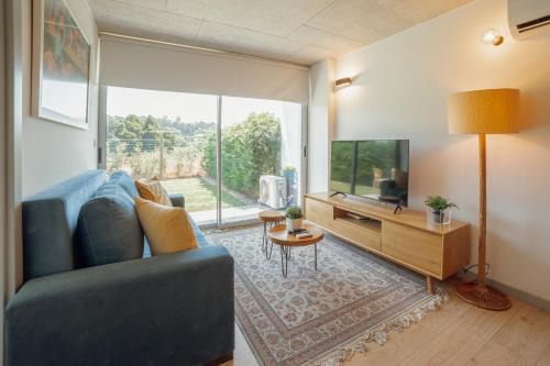Vila Nova de Gaia Apartment | Amazing Design With Garden & Pool by Vacationy