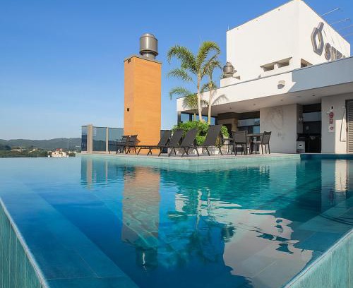 Centro Apartment | Ap completo a 900m da Oktoberfest com Piscina, academia, Wi-Fi, ar condicionado e garagem privativa