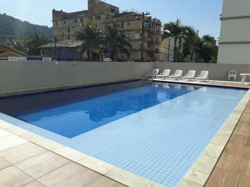 Vila Julia Apartment | Apartamento 500m Praia da Enseada Guarujá varanda e vaga de garagem