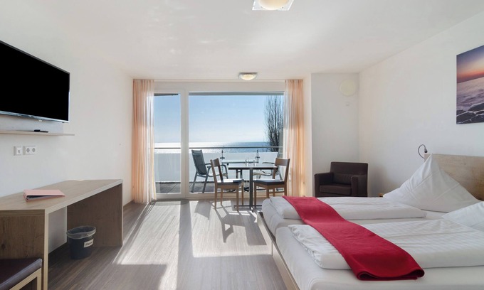 Immenstaad am Bodensee Apartment | Apartment 'Apt Typ A1 21' with Shared Terrace, Shared Garden and Wi-Fi