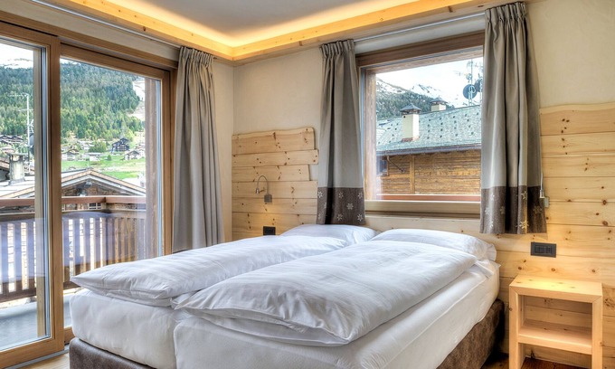 Livigno Apartment | Apartment 'Abete' with Mountain View, Shared Garden and Wi-Fi