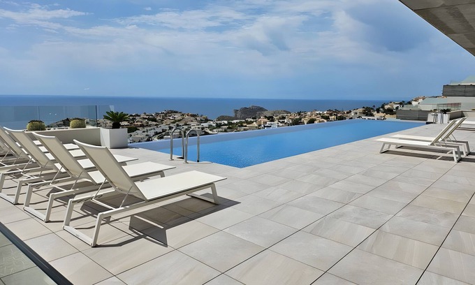 Cumbre del Sol Apartment | Apartment 'Blue Infinity 7' with Sea View, Wi-Fi and Air Conditioning