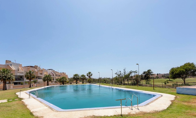 Retamar Apartment | Apartment 'Campo De Golf, Piscina Y Padel' with Sea View, Shared Pool and Air Conditioning