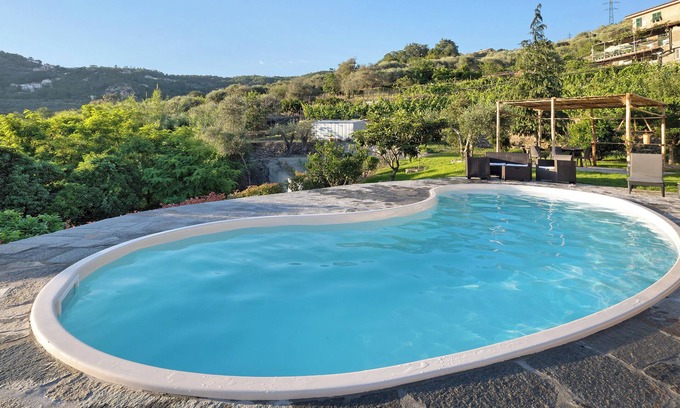 Gorra Apartment | Apartment 'Casa chicken - mare, monti e bikers' with Mountain View, Shared Pool, Garden & Wi-Fi