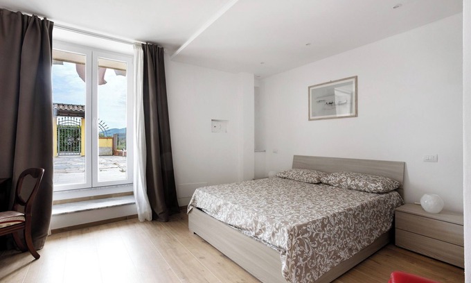 Sarzana Apartment | Apartment 'Casa Marisa' with Private Garden, Wi-Fi and Air Conditioning