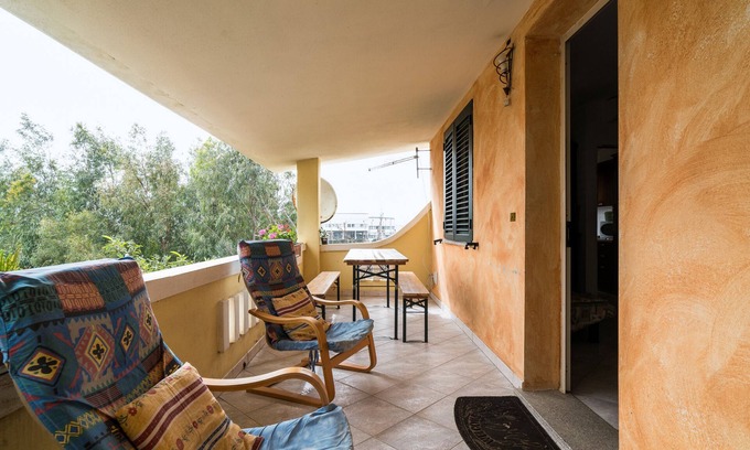 Budoni Apartment | Apartment 'Casa Nel Centro Di Budoni' with Balcony and Air Conditioning