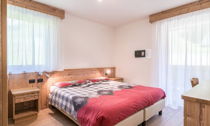 Canazei Apartment | Apartment Ciasa Rosa with Mountain View, Balconies & Shared Garden