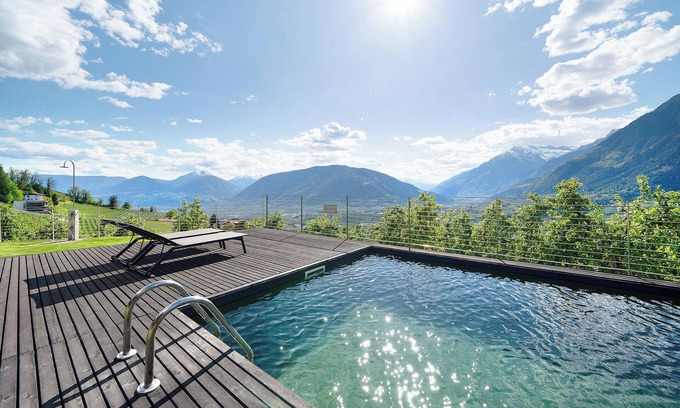Schenna Apartment | Apartment 'Dahoam - Gardensuite L' with Mountain View, Shared Pool and Wi-Fi
