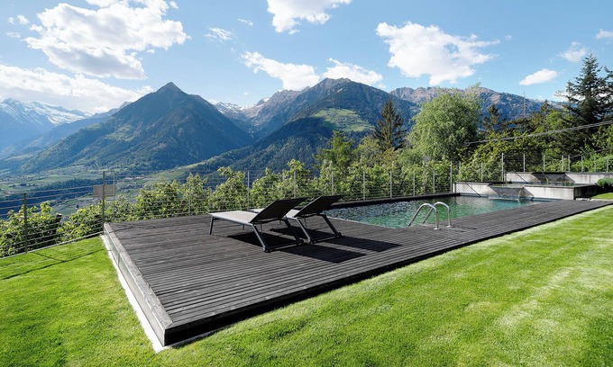 Schenna Apartment | Apartment 'Dahoam - Gardensuite R' with Mountain View, Shared Pool and Wi-Fi
