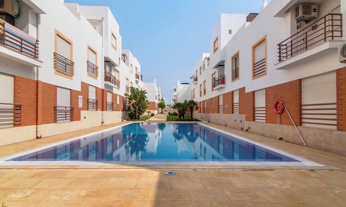 Conceicao e Cabanas de Tavira Apartment | Apartment 'Duplex Em Tavira' with Shared Pool, Wi-Fi and Air Conditioning